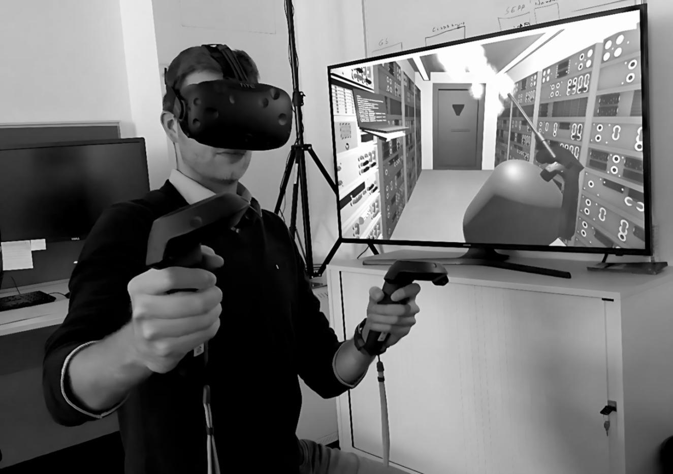 Students working on VR development projects in collaborative learning environment